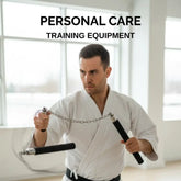 Man in a white martial arts uniform holding Nunchucks training equipment