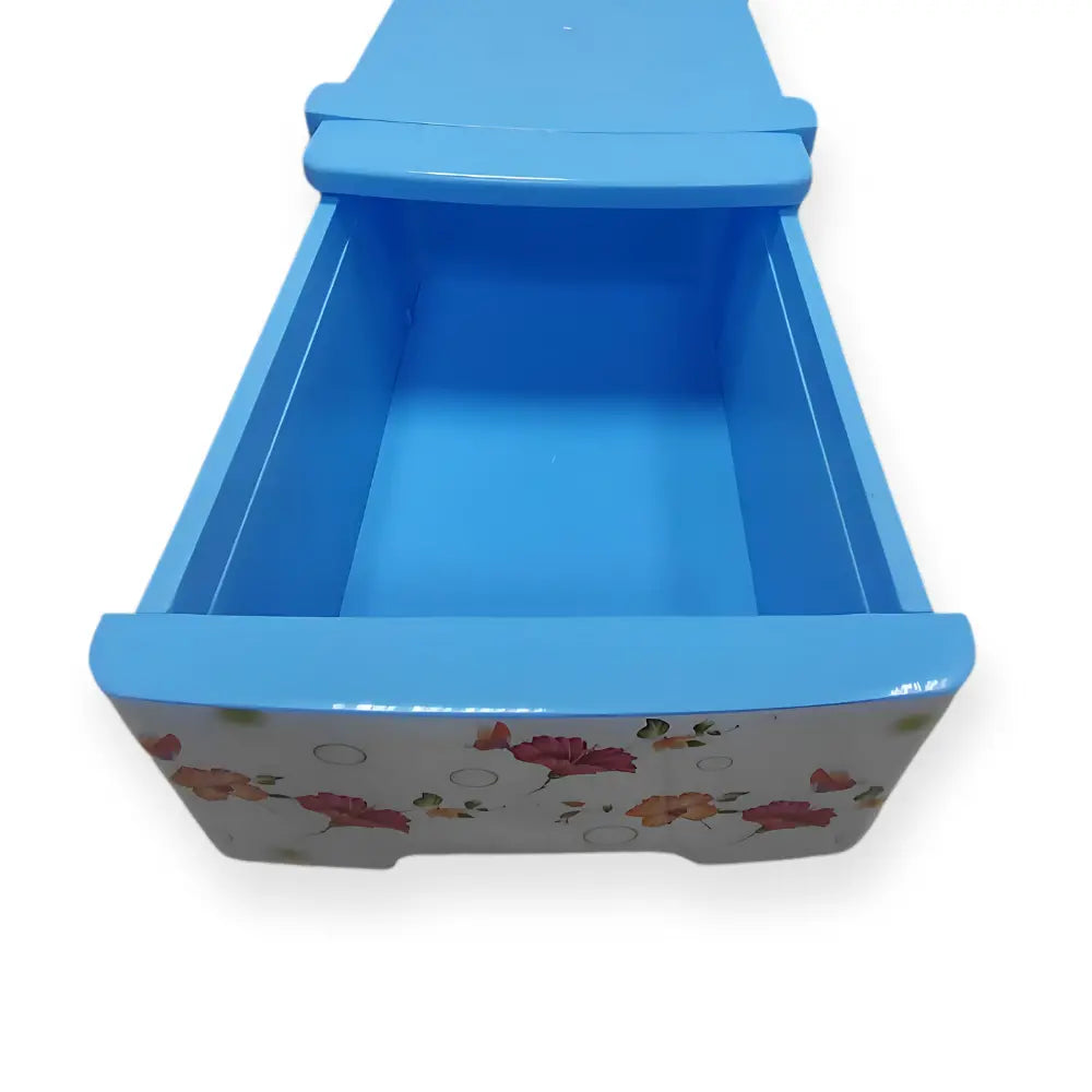 Blue storage drawer with floral design