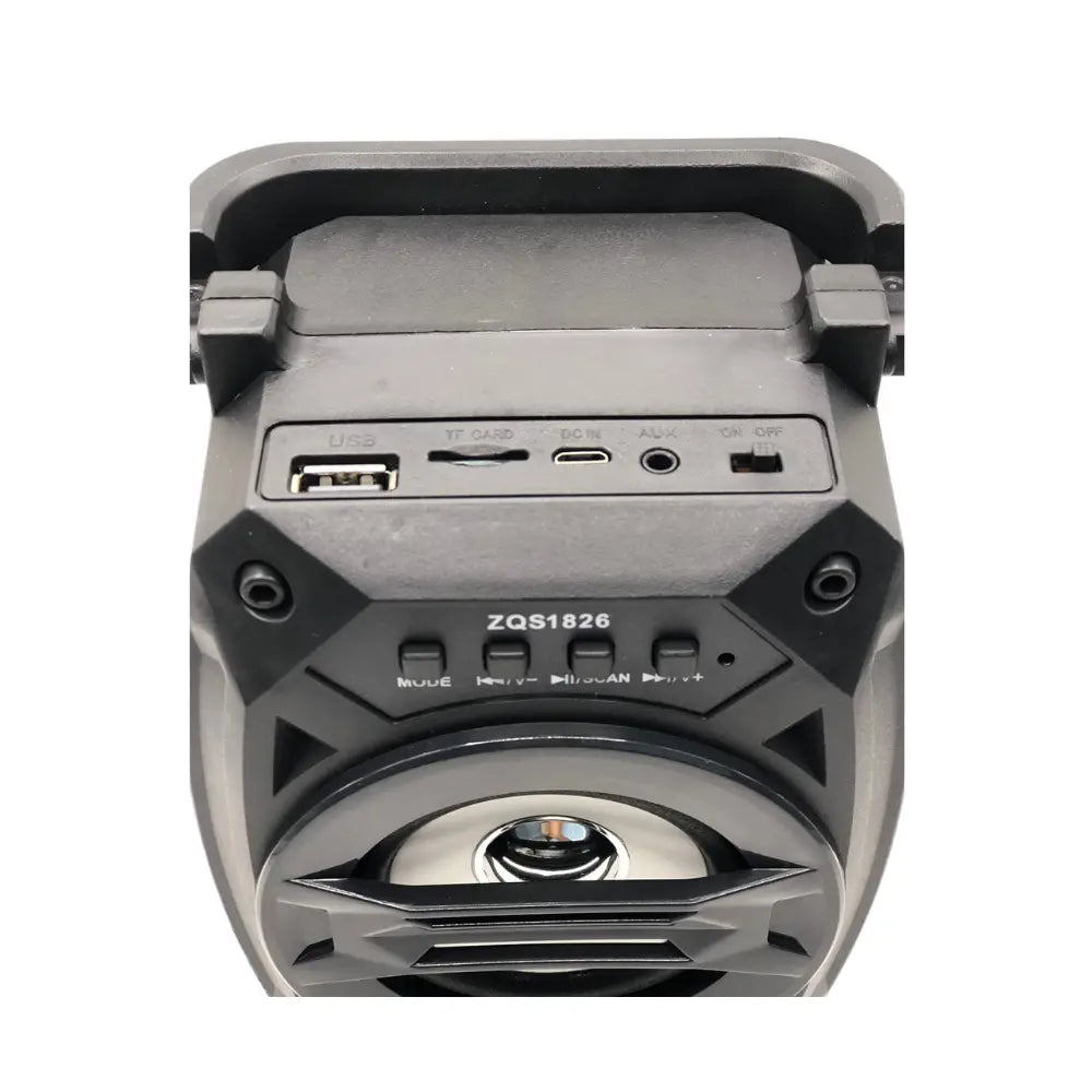 Back view of a gray and black speaker with connectivity ports on a white background