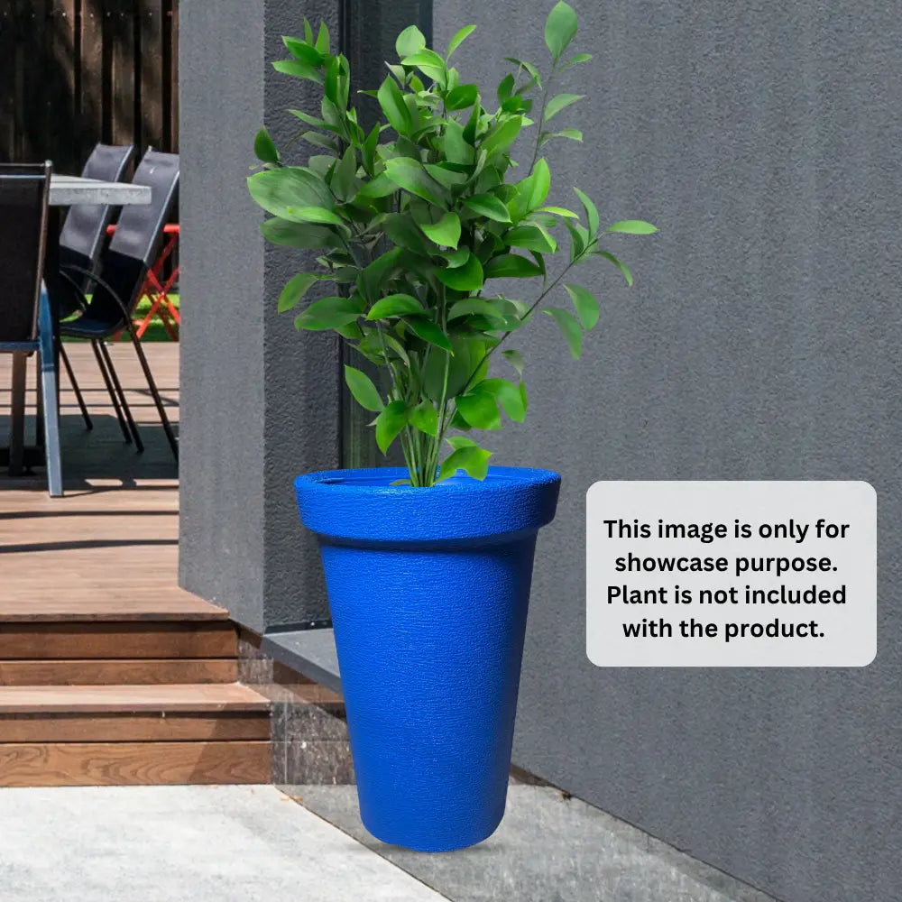 Blue planter with a plant on a patio area
