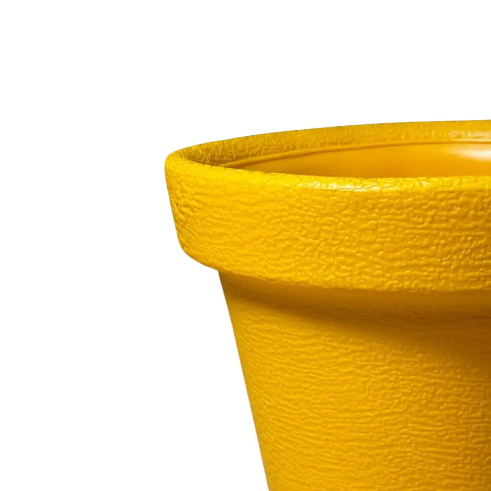 Close-up of a textured yellow pot