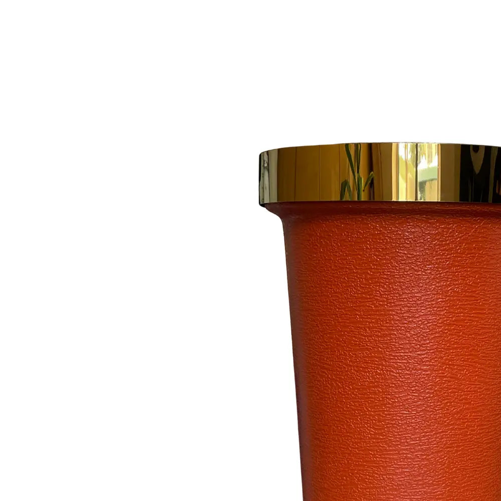 Brown textured vase with a gold rim