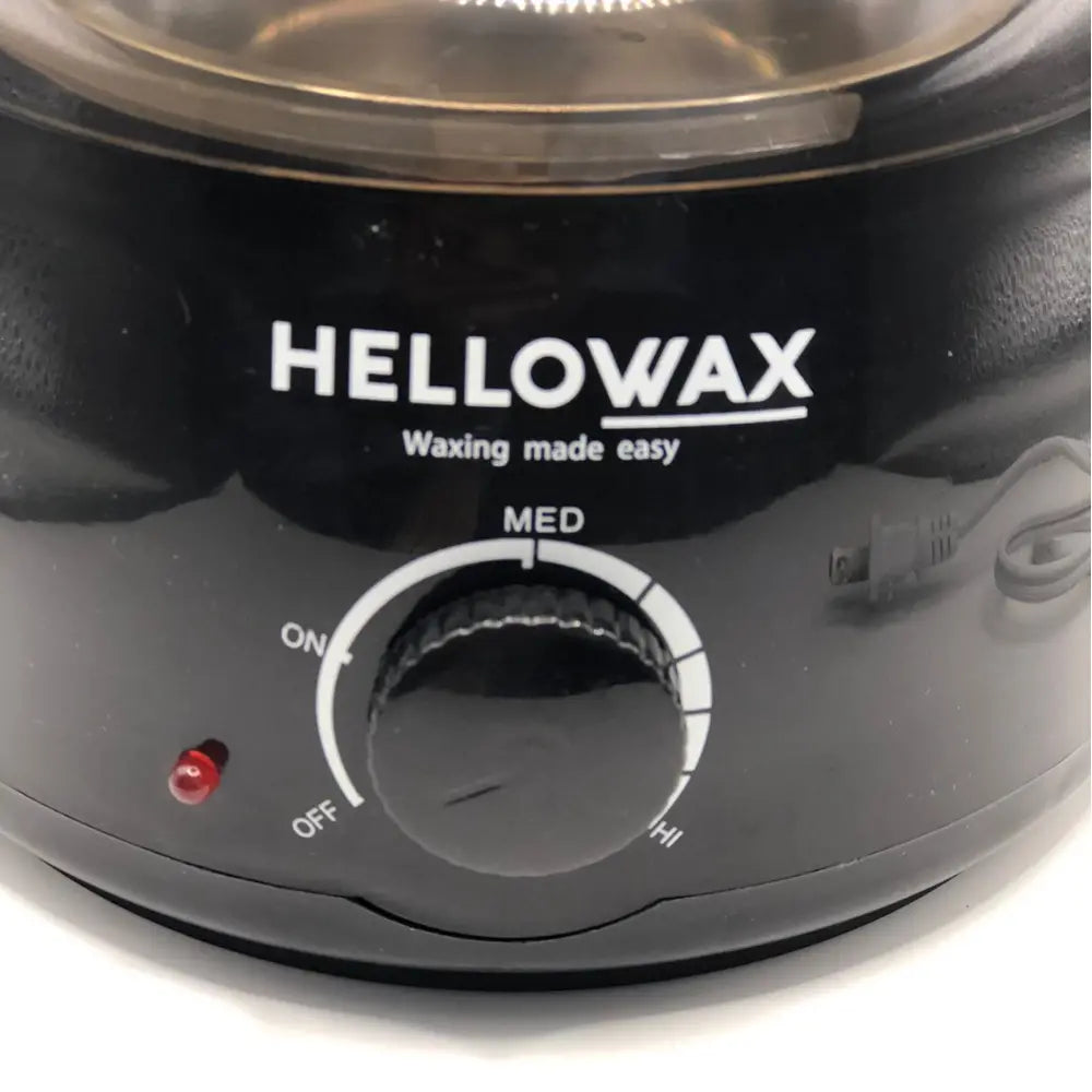Black Hellowax waxing machine with control knob on a white background