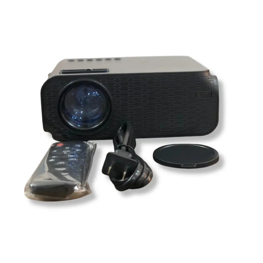 Black projector with remote control and lens cap