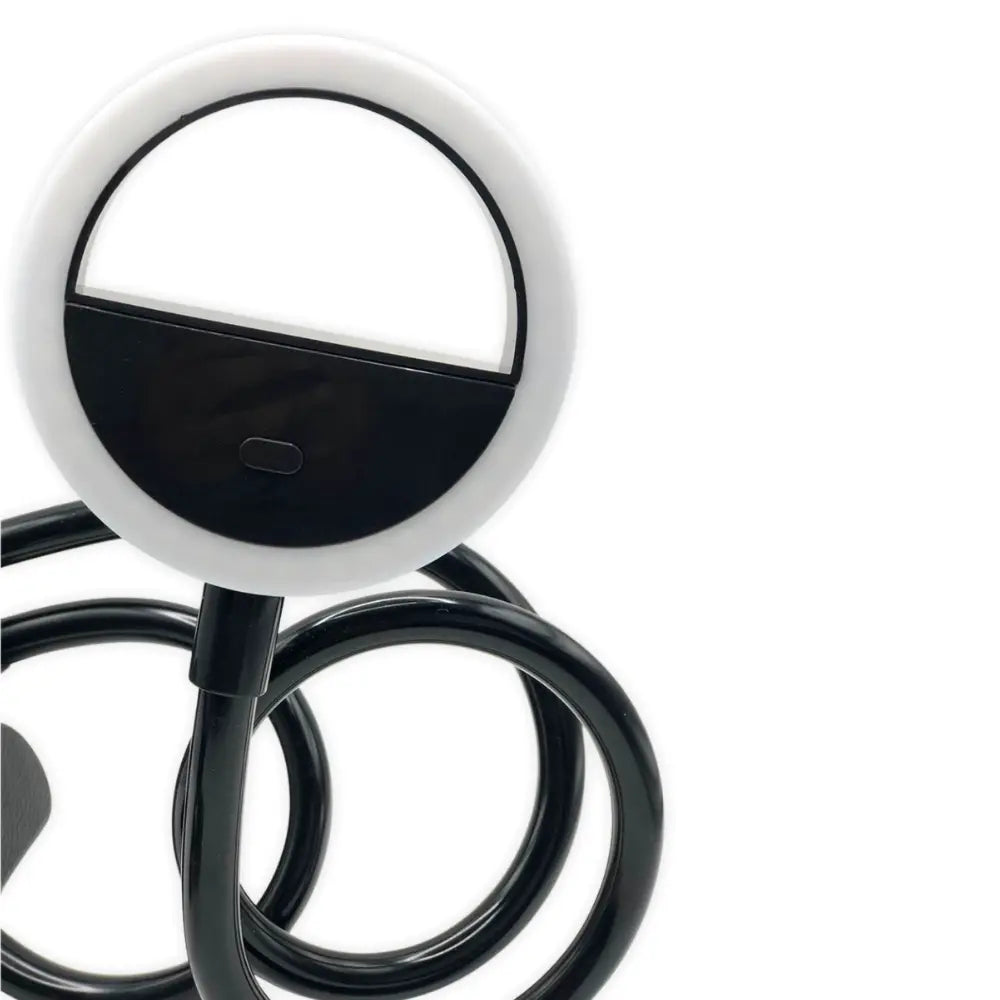 Close-up of a black and white ring light on a white background