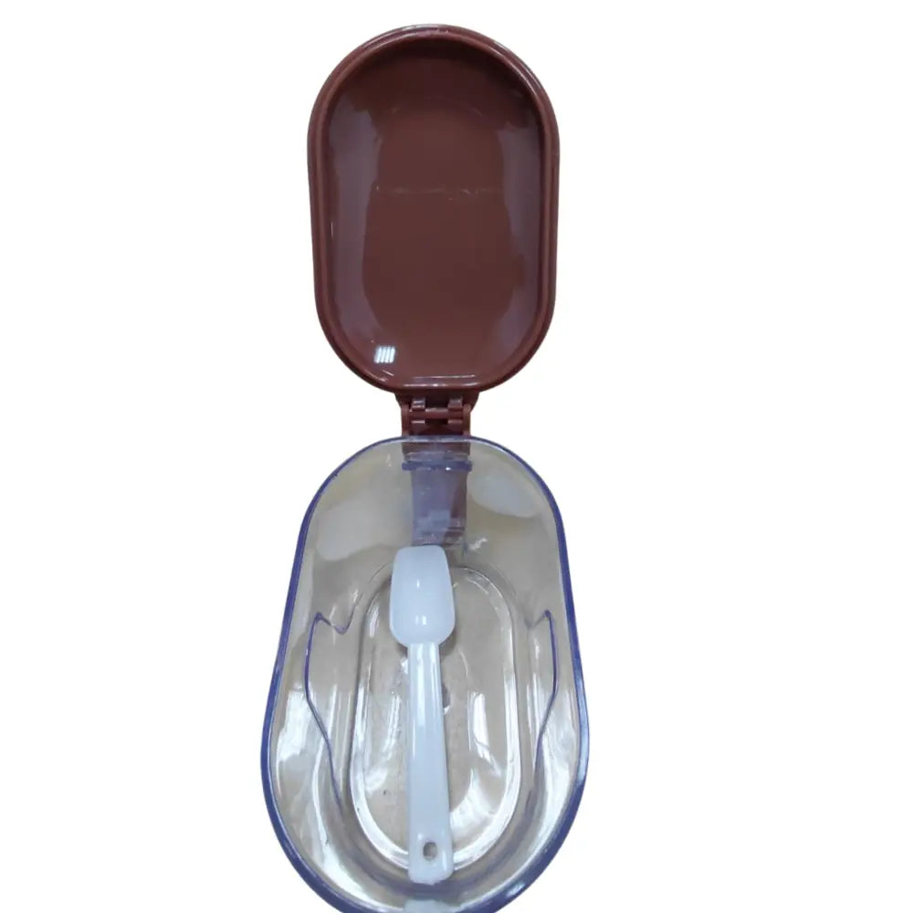 Small oval brown food container jar with a brown lid and clear body