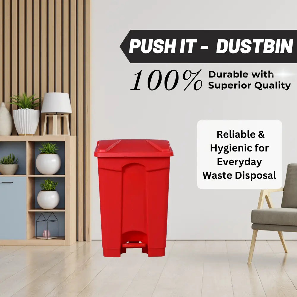 Red dustbin in a room with furniture and decor