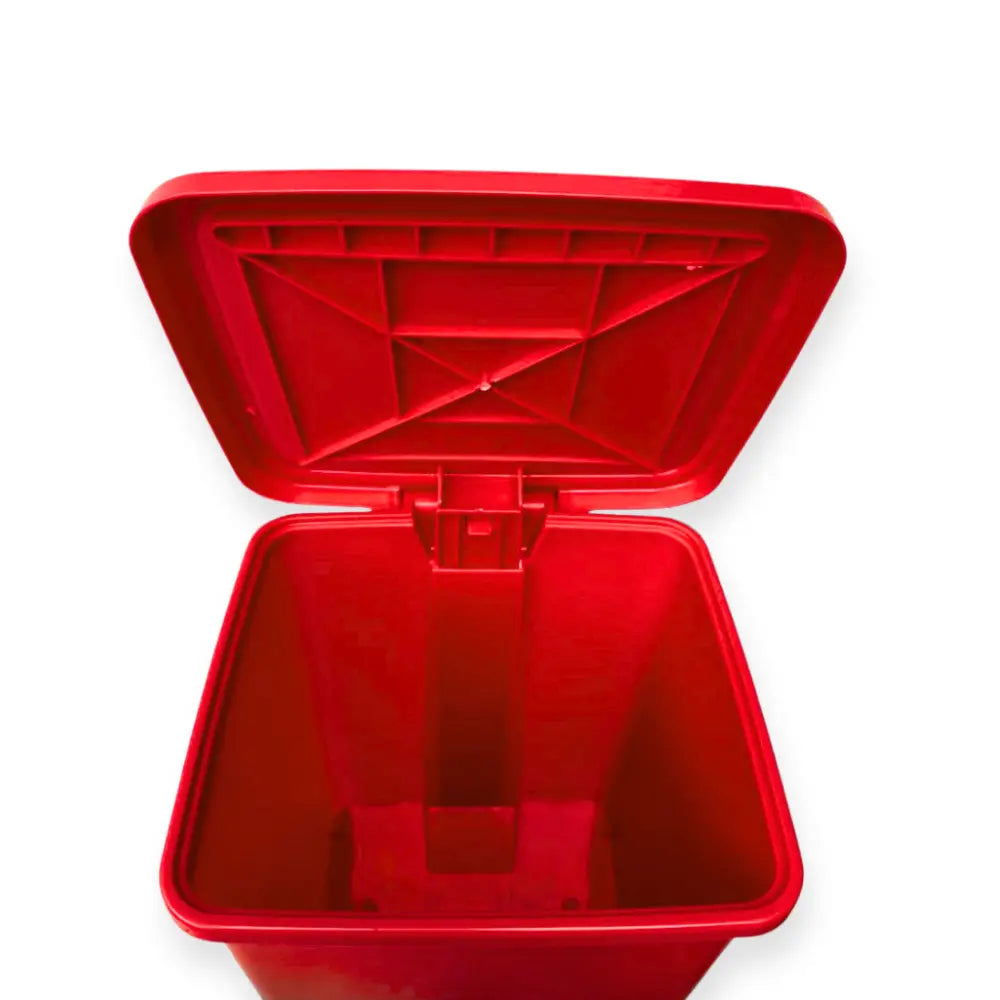 Red plastic trash bin with open lid
