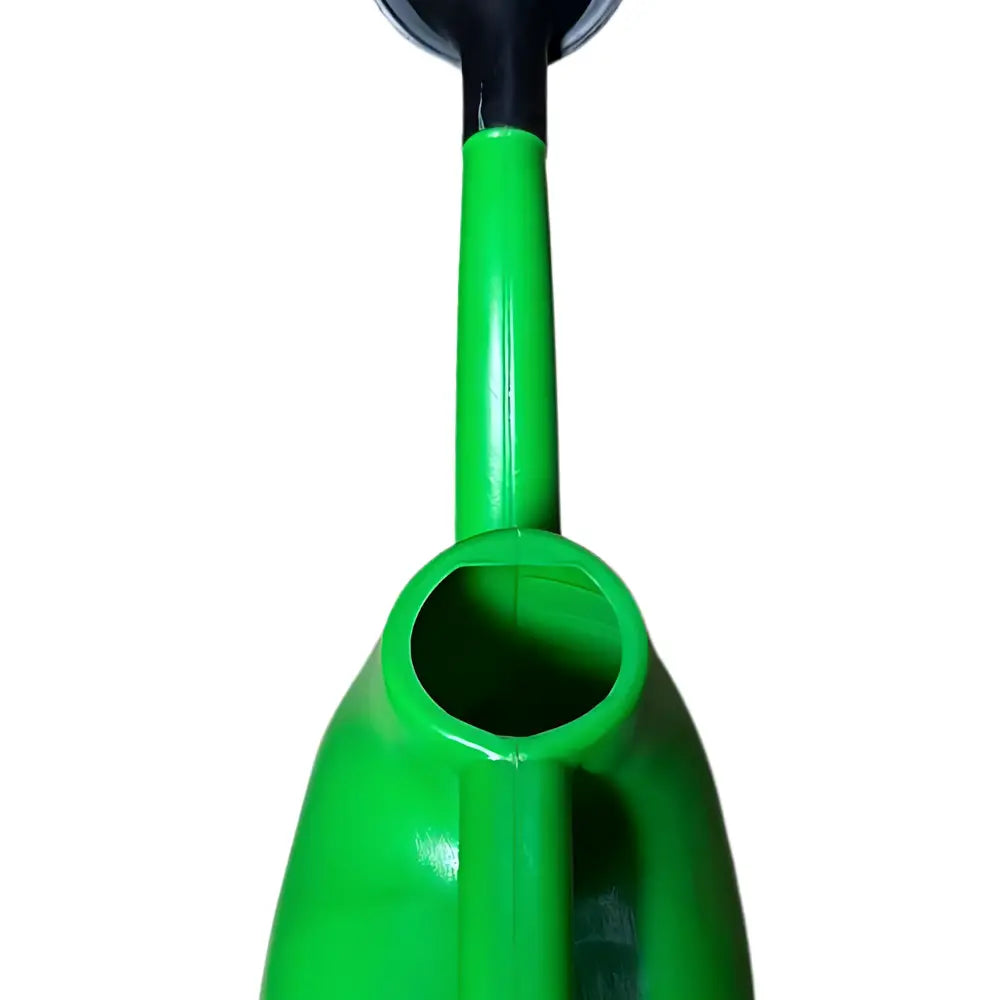 Close-up of a green watering can handle